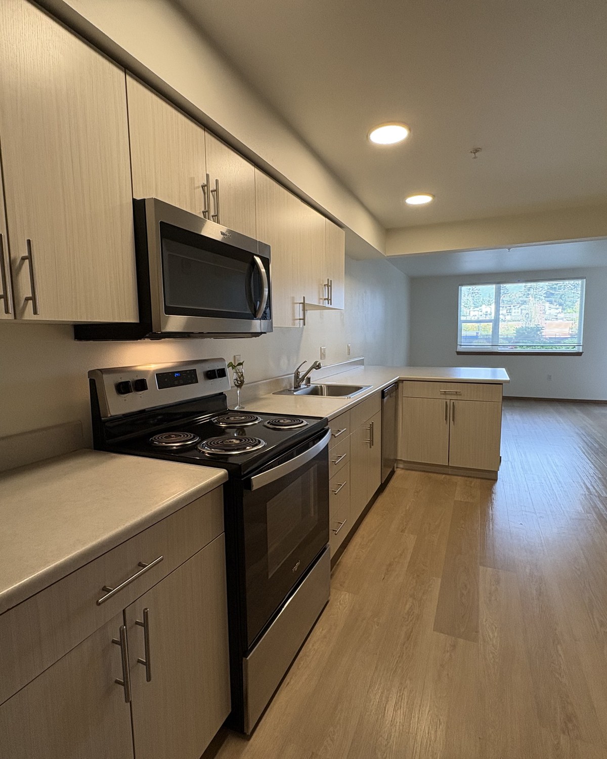 Freshly cleaned Seattle apartment kitchen and living area